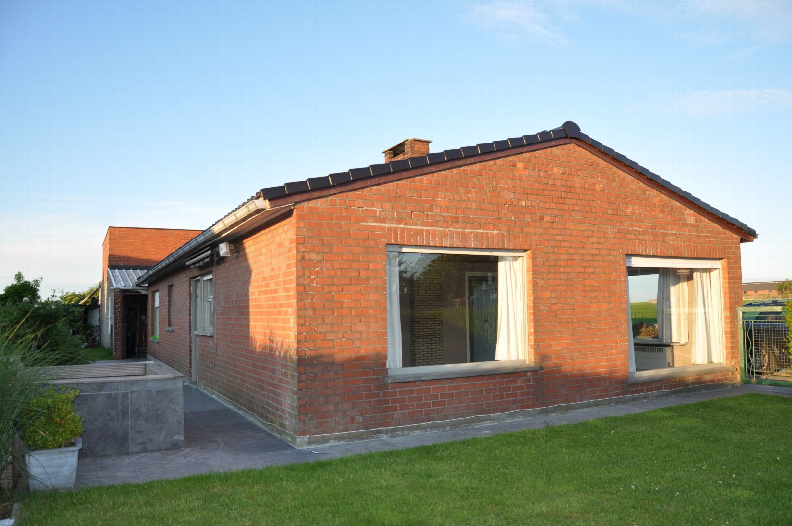 Vertrekpunt: De oorspronkelijke bungalow bij aankoop.